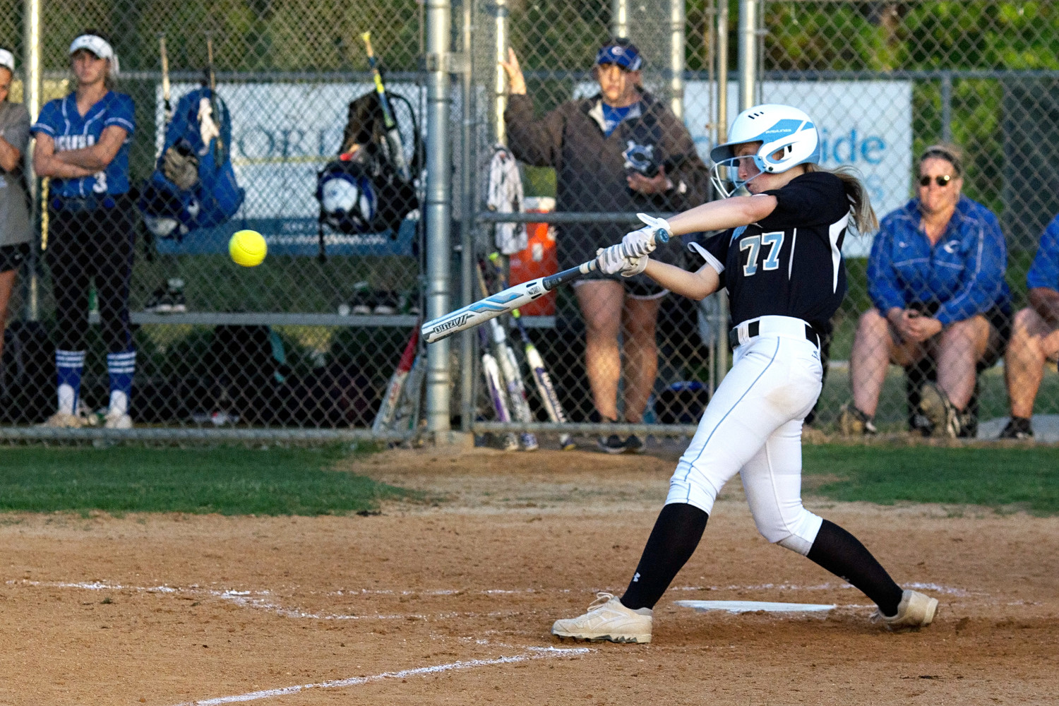 # 77 Maggie Richardson lines a base hit for the Sharks